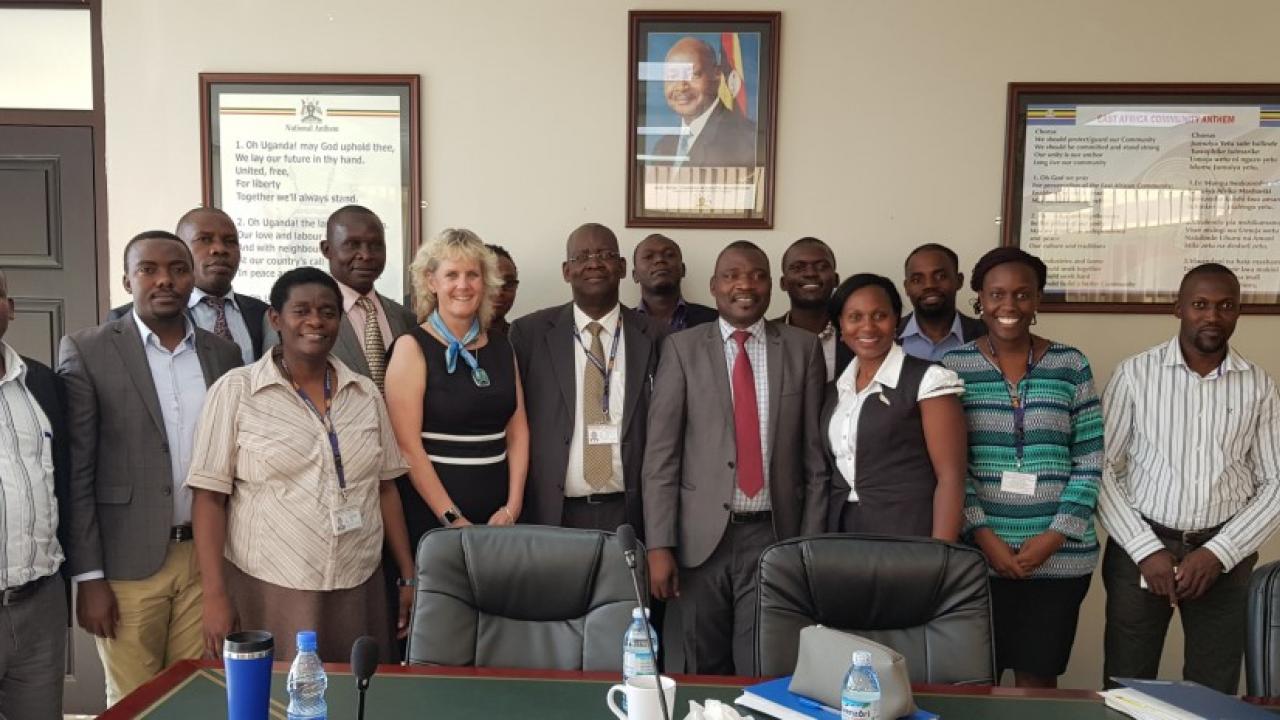 Dr. Alison Van Eenennaam with staff at the Ministry of Science, Technology and Innovation in Kampala