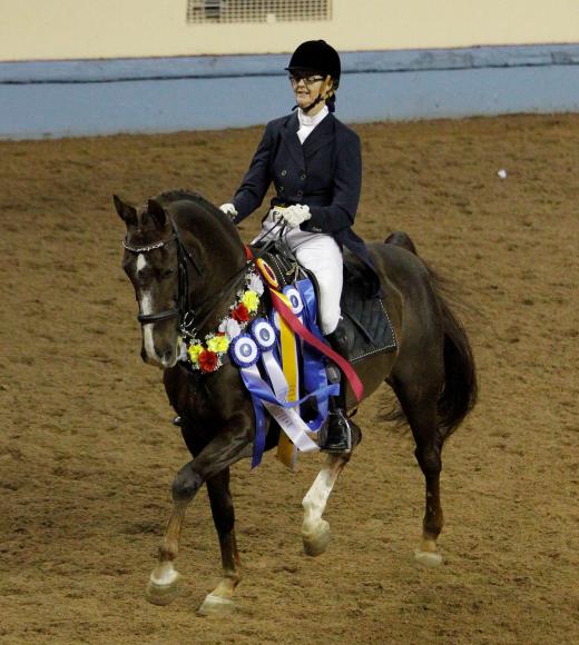 Photo of Josie Trott on horseback